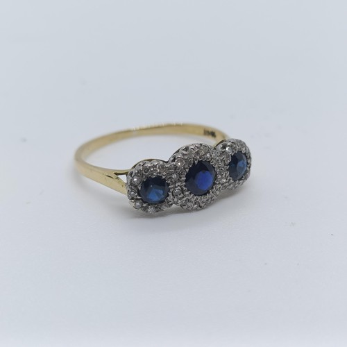 121 - An 18ct gold, diamond and sapphire ring, ring size P