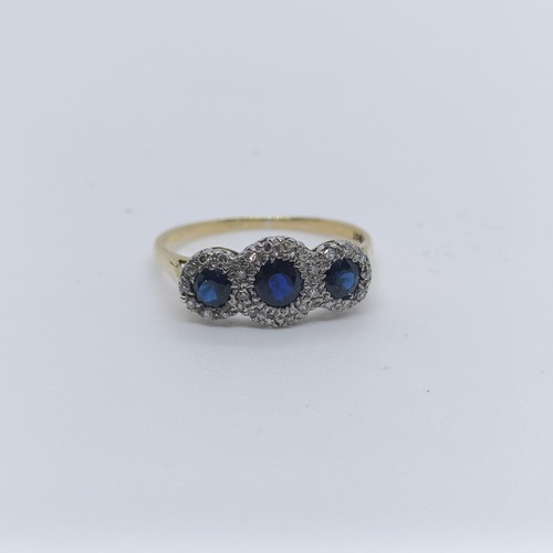 121 - An 18ct gold, diamond and sapphire ring, ring size P