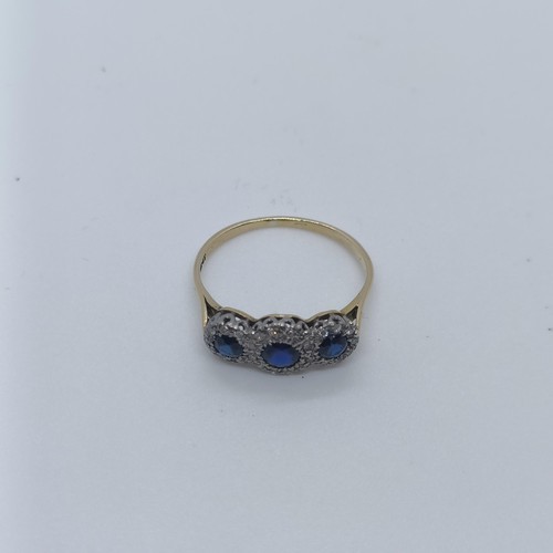 121 - An 18ct gold, diamond and sapphire ring, ring size P