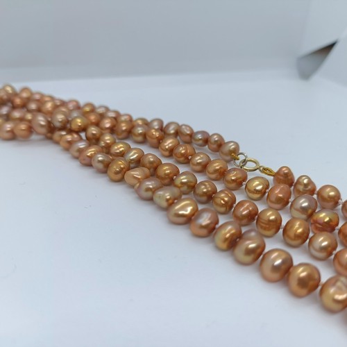 124 - A coloured cultured pearl necklace  Provenance: From a large single owner collection of jewellery co... 