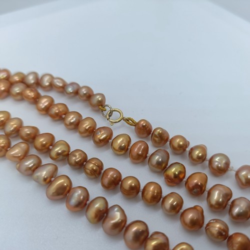 124 - A coloured cultured pearl necklace  Provenance: From a large single owner collection of jewellery co... 