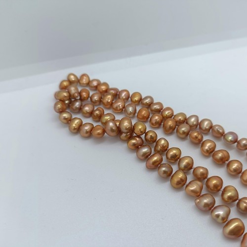 124 - A coloured cultured pearl necklace  Provenance: From a large single owner collection of jewellery co... 