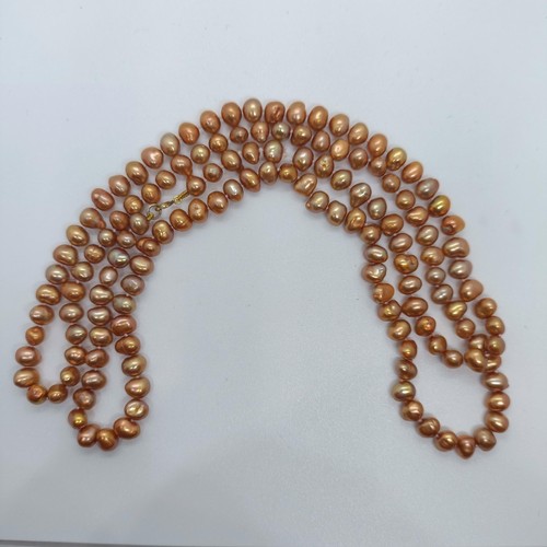 124 - A coloured cultured pearl necklace  Provenance: From a large single owner collection of jewellery co... 