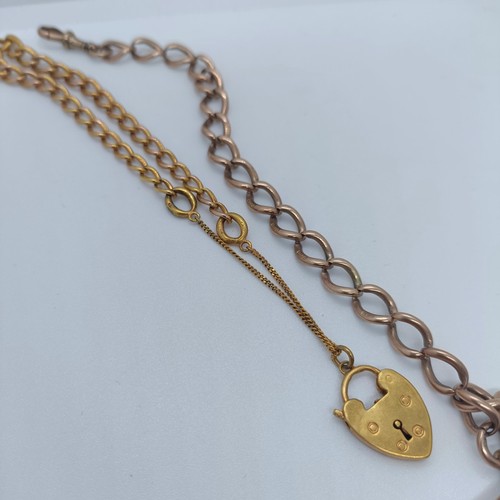 127 - A 9ct gold Albert, and a 9ct gold bracelet, with a heart shape padlock clasp, 24.4 g  Provenance: Fr... 