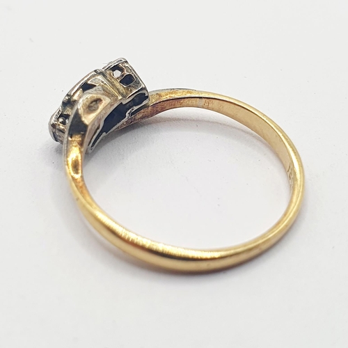 12 - An 18ct gold, and three stone diamond ring, ring size L