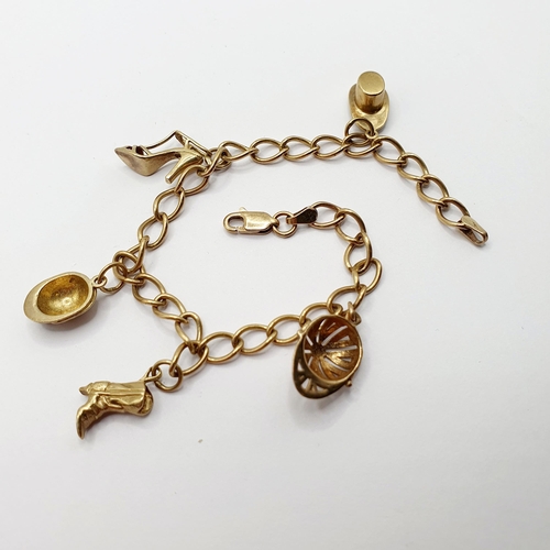 2 - A 9ct gold charm bracelet, and assorted charms Provenance: From a large single owner collection of j... 