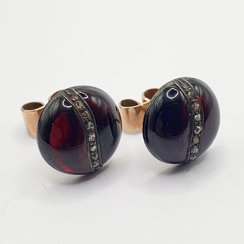 21 - A pair of early 20th century stud earrings, in a vintage jewellery box