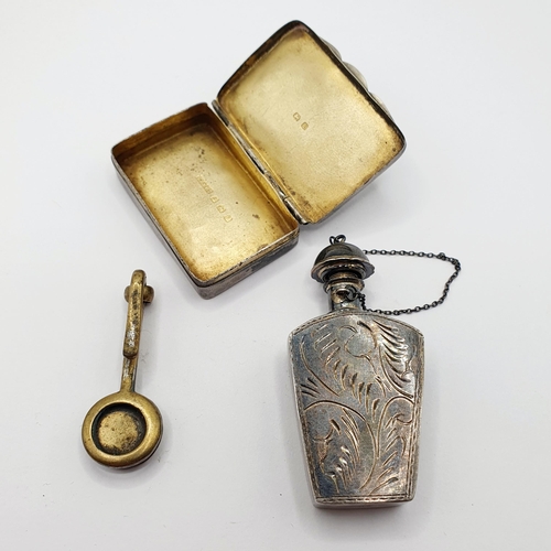 25 - A Continental silver perfume bottle, a snuff box and a clip