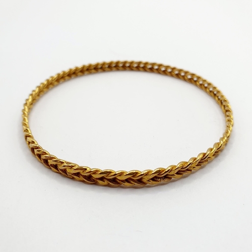 3 - An 18ct gold bangle, 13.4 g Provenance: From a large single owner collection of jewellery consigned ... 