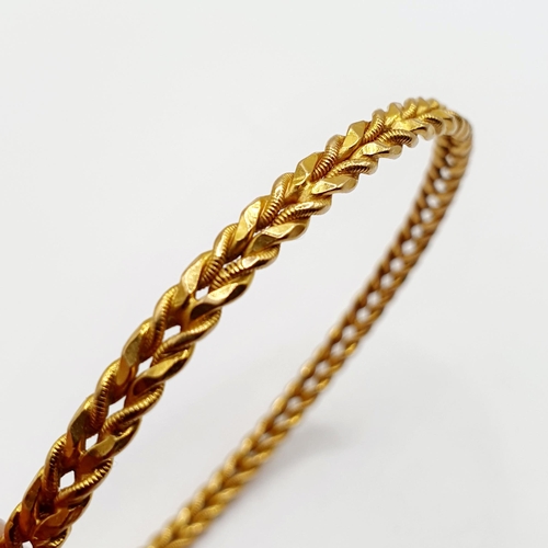 3 - An 18ct gold bangle, 13.4 g Provenance: From a large single owner collection of jewellery consigned ... 