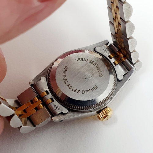 467 - A ladies stainless steel and gold Rolex Oyster Perpetual wristwatch, with two spare links, boxes and... 