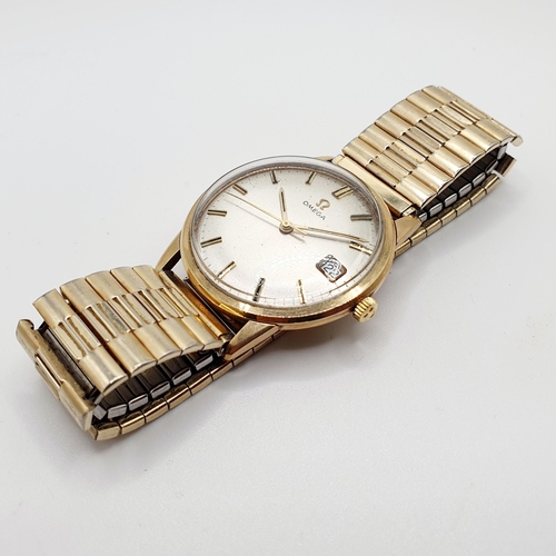 469 - An Omega gentleman's wristwatch, on an expanding strap, with paperwork