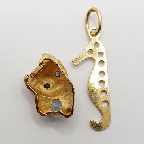 57 - A yellow metal and white stone pendant, in the form of a kitten, and a yellow metal pendant, in the ... 