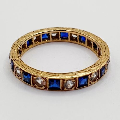 6 - A yellow metal, sapphire and diamond full eternity ring, ring size N  Provenance: From a large singl... 