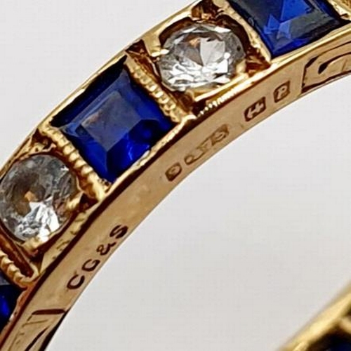 6 - A yellow metal, sapphire and diamond full eternity ring, ring size N  Provenance: From a large singl... 