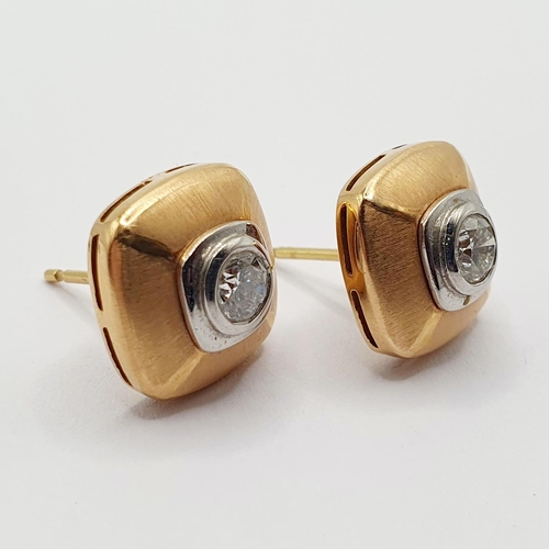 62 - A pair of Boodles Amare 18ct gold, platinum and diamond set ear studs 
Provenance: From a large sing... 