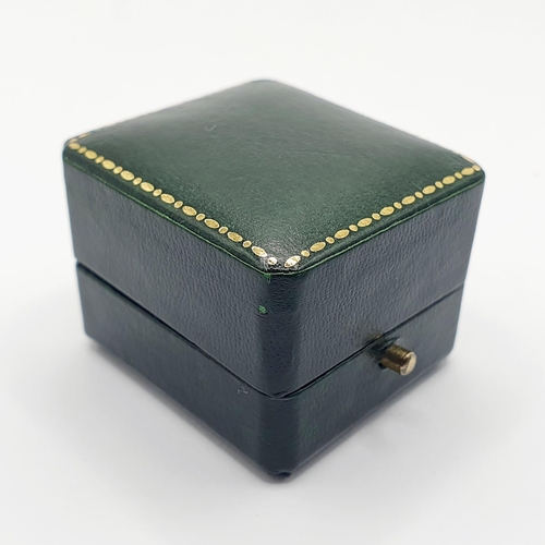 64 - An 18ct gold five stone diamond ring, ring size M, in a green leather jewellery box