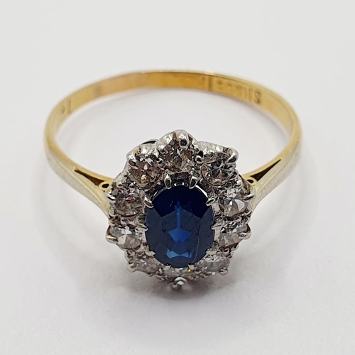 73 - An 18ct gold, sapphire and diamond cluster ring, ring size Q