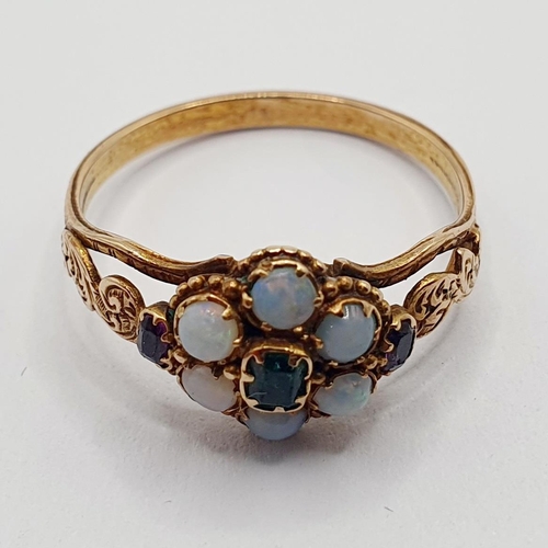 75 - An antique yellow metal, opal and green stone ring, ring size N