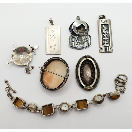 84 - A cameo brooch, and assorted other brooches