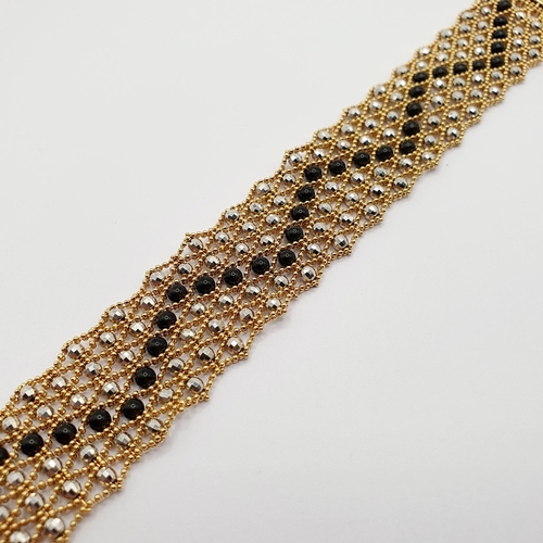 93 - A Swiss 18ct gold and metal bead bracelet
Provenance: From a large single owner collection of jewell... 