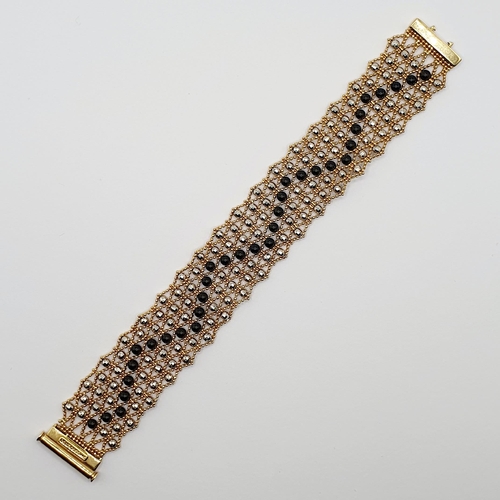 93 - A Swiss 18ct gold and metal bead bracelet
Provenance: From a large single owner collection of jewell... 