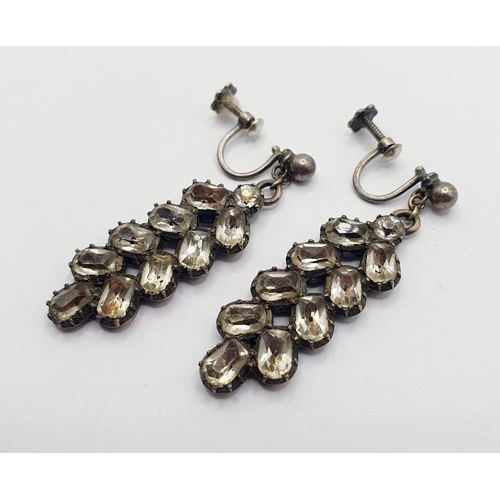 96 - A pair of late 19th/early 20th century paste set drop earrings