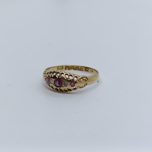 130 - An 18ct gold, ruby and diamond ring, ring size R