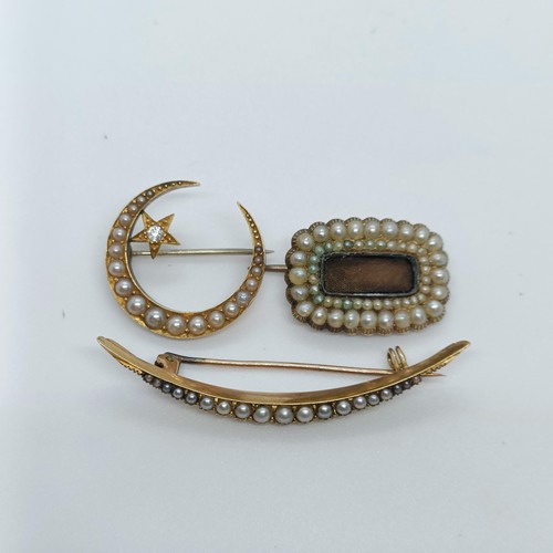 137 - A 15ct gold and seed pearl crescent brooch, and two other brooches (3)