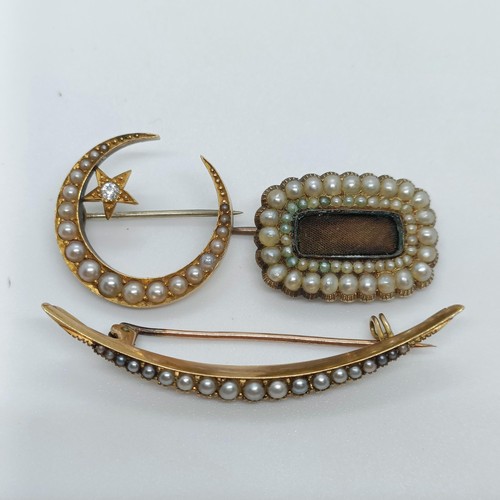 137 - A 15ct gold and seed pearl crescent brooch, and two other brooches (3)