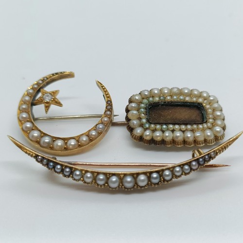 137 - A 15ct gold and seed pearl crescent brooch, and two other brooches (3)