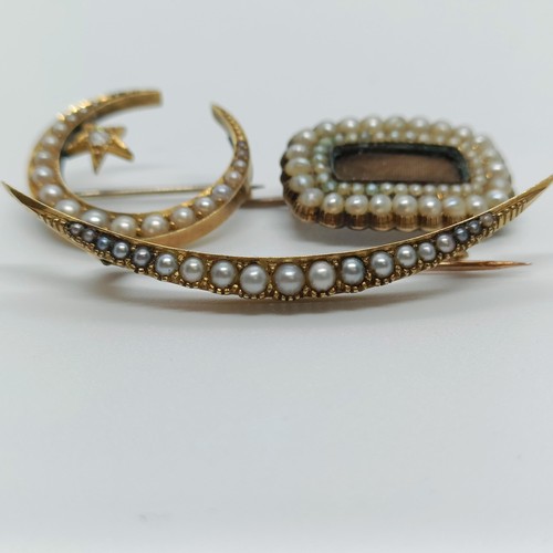 137 - A 15ct gold and seed pearl crescent brooch, and two other brooches (3)