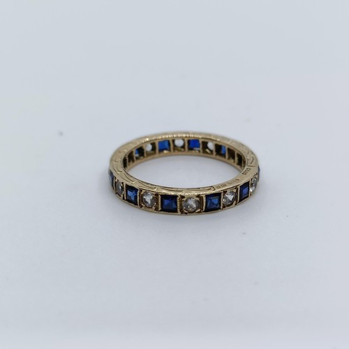 6 - A yellow metal, sapphire and diamond full eternity ring, ring size N  Provenance: From a large singl... 