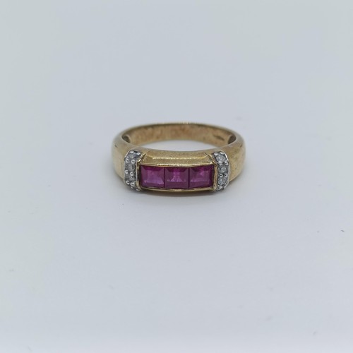 141 - An 9ct gold, ruby and diamond ring, ring size O