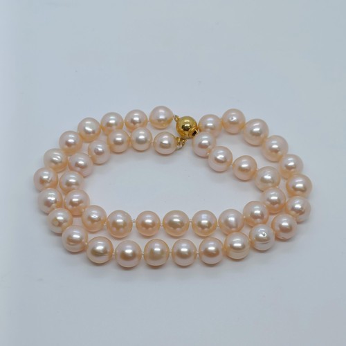 148 - A pink cultured pearl necklace  Provenance: From a large single owner collection of jewellery consig... 