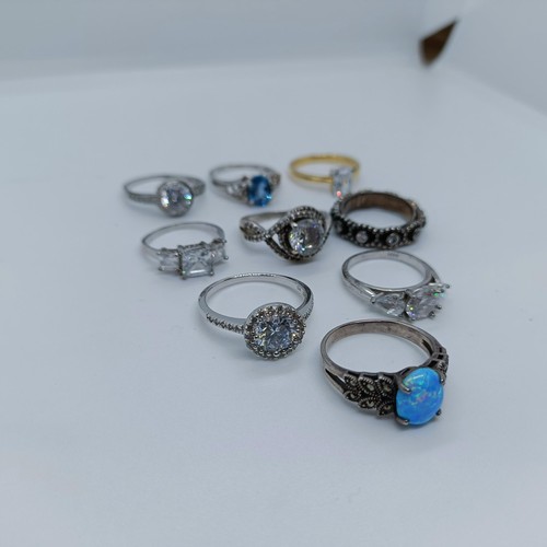 150 - A silver and opal dress ring, and assorted other dress rings