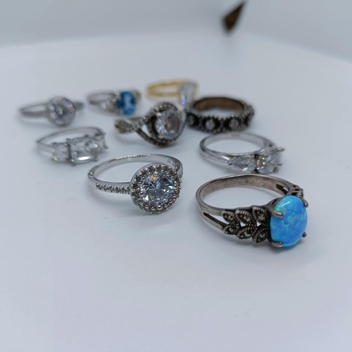 150 - A silver and opal dress ring, and assorted other dress rings