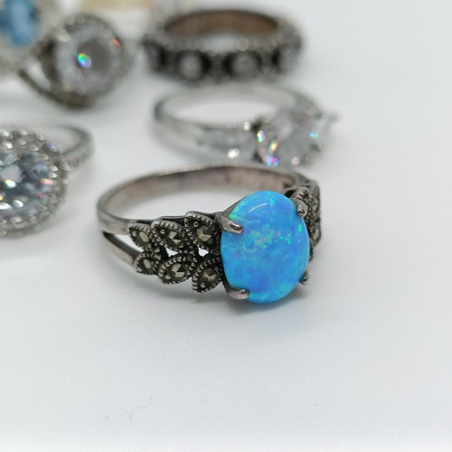 150 - A silver and opal dress ring, and assorted other dress rings