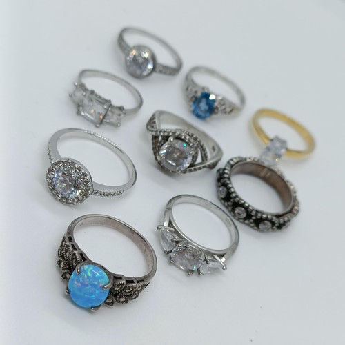 150 - A silver and opal dress ring, and assorted other dress rings