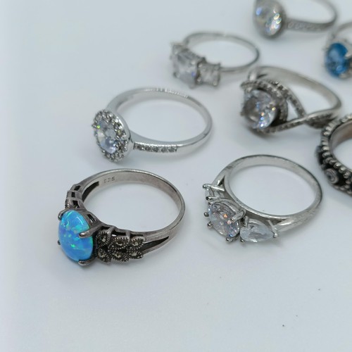 150 - A silver and opal dress ring, and assorted other dress rings