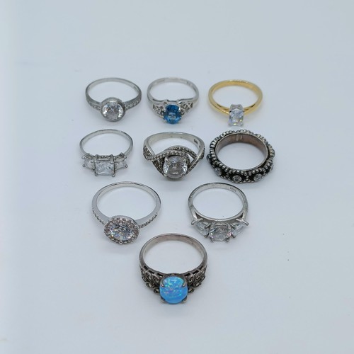 150 - A silver and opal dress ring, and assorted other dress rings