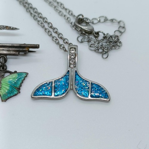 168 - A silver coloured metal whale fin pendant, on a chain, and assorted other jewellery