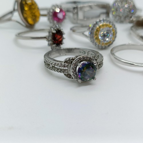 170 - A silver coloured metal and blue stone dress ring, and assorted other dress rings