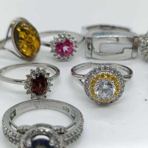 170 - A silver coloured metal and blue stone dress ring, and assorted other dress rings