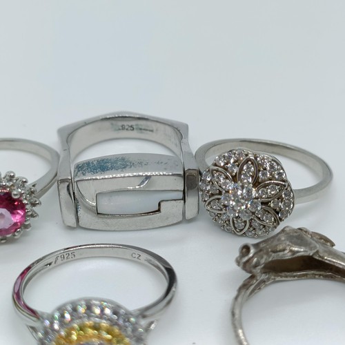 170 - A silver coloured metal and blue stone dress ring, and assorted other dress rings