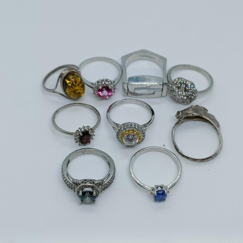 170 - A silver coloured metal and blue stone dress ring, and assorted other dress rings