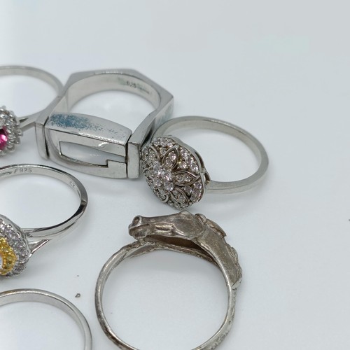 170 - A silver coloured metal and blue stone dress ring, and assorted other dress rings