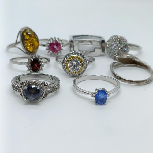 170 - A silver coloured metal and blue stone dress ring, and assorted other dress rings