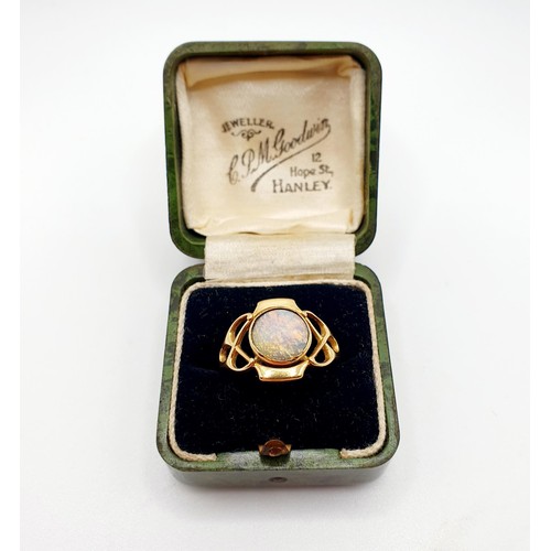 142 - An 18ct gold and opal ring, by Murrle Bennett, ring size P, in a vintage jewellery box, retail label... 