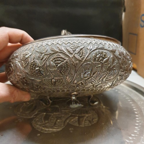 836 - An Eastern silver coloured metal pot-pourri vase and two trays (3)